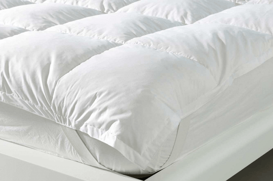 Topper materasso: cos'è e come aiuta a dormire meglio
